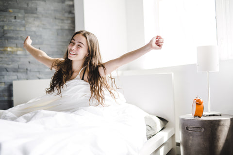 teen waking up from a great night of sleep 